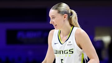 Jun 17, 2025; Arlington, Texas, USA;  Dallas Wings guard Paige Bueckers (5) reacts during the second half against the Golden State Valkyries at College Park Center. Mandatory Credit: Kevin Jairaj-Imagn Images