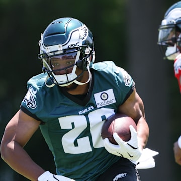 Philadelphia Eagles running back Saquon Barkley carries the ball during practice. 