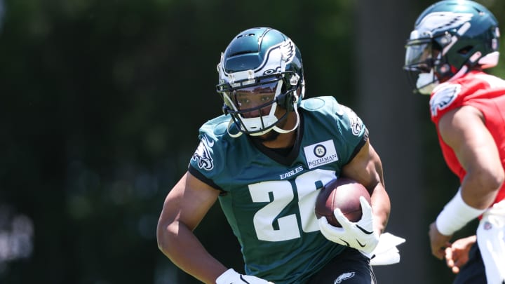 May 30, 2024; Philadelphia, PA, USA; Philadelphia Eagles running back Saquon Barkley (26) runs with the ball during practice at NovaCare Complex. 