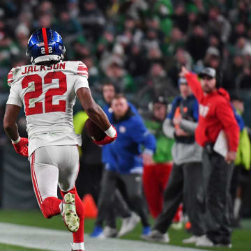 Dec 25, 2023; Philadelphia, Pennsylvania, USA; New York Giants cornerback Adoree' Jackson (22) returns an interception for a touchdown against the Philadelphia Eagles during the third quarter at Lincoln Financial Field. Mandatory Credit: Eric Hartline-USA TODAY Sports