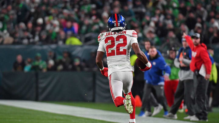 Dec 25, 2023; Philadelphia, Pennsylvania, USA; New York Giants cornerback Adoree' Jackson (22) returns an interception for a touchdown against the Philadelphia Eagles during the third quarter at Lincoln Financial Field. Mandatory Credit: Eric Hartline-USA TODAY Sports