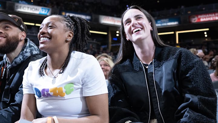 Indiana Fever guards Caitlin Clark and guard Kelsey Mitchell take in an Indiana Pacers game at Gainbridge Fieldhouse. Indiana Fever guards Caitlin Clark and guard Kelsey Mitchell take in an Indiana Pacers game at Gainbridge Fieldhouse.