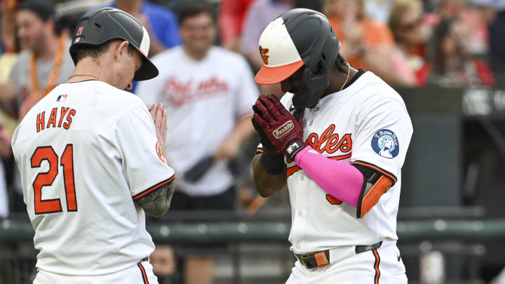 Jun 11, 2024; Baltimore, Maryland, USA; Baltimore Orioles shortstop Jorge Mateo (3) celebrates with  outfielder Austin Hays (21) after hitting a three run home run in the second inning against the Atlanta Braves  at Oriole Park at Camden Yards.