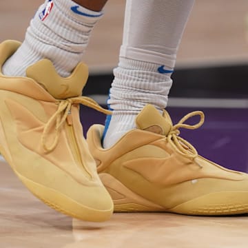 Shai Gilgeous-Alexander wears the Converse SHAI 001 "BUTTER" colorway.