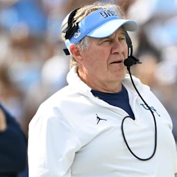 North Carolina coach Bill Belichick stands on the sidelines in the second quarter at Kenan Stadium.