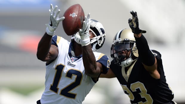 September 15, 2019; Rams receiver Brandin Cooks (12) catches a pass against Saints cornerback Marshon Lattimore (23)