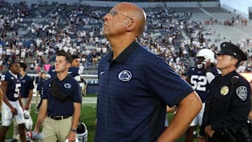 Sep 13, 2025; University Park, Pennsylvania, USA; Penn State Nittany Lions head coach James Franklin watches the replay of the final play of the game following the end of the game against the Villanova Wildcats at Beaver Stadium. Mandatory Credit: Matthew O'Haren-Imagn Images