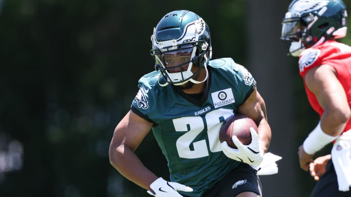 May 30, 2024; Philadelphia, PA, USA; Philadelphia Eagles running back Saquon Barkley (26) runs with the ball during practice at NovaCare Complex. Bill Streicher-USA TODAY Sports