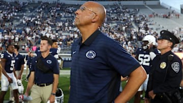 Sep 13, 2025; University Park, Pennsylvania, USA; Penn State Nittany Lions head coach James Franklin watches the replay of the final play of the game following the end of the game against the Villanova Wildcats at Beaver Stadium. Mandatory Credit: Matthew O'Haren-Imagn Image