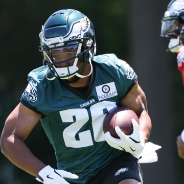 May 30, 2024; Philadelphia, PA, USA; Philadelphia Eagles running back Saquon Barkley (26) runs with the ball during practice at NovaCare Complex. Mandatory Credit: Bill Streicher-USA TODAY Sports