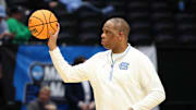 Mar 17, 2025; Dayton, OH, USA; North Carolina Tar Heels head coach Hubert Davis passes the ball during the First Four Practice at UD Arena. Mandatory Credit: Rick Osentoski-Imagn Images