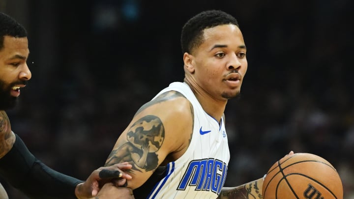 May 5, 2024; Cleveland, Ohio, USA; Orlando Magic guard Markelle Fultz (20) drives to the basket against Cleveland Cavaliers forward Marcus Morris Sr. (24) during the first half in game seven of the first round for the 2024 NBA playoffs at Rocket Mortgage FieldHouse. Mandatory Credit: Ken Blaze-USA TODAY Sports