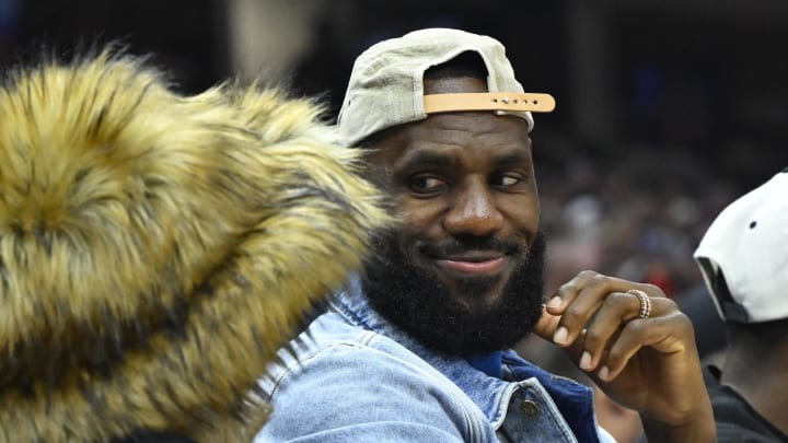 May 13, 2024; Cleveland, Ohio, USA; Los Angeles Lakers forward LeBron James looks at his wife Savannah James in the second quarter of game four of the second round for the 2024 NBA playoffs between the Cleveland Cavaliers and the Boston Celtics at Rocket Mortgage FieldHouse. Mandatory Credit: David Richard-USA TODAY Sports