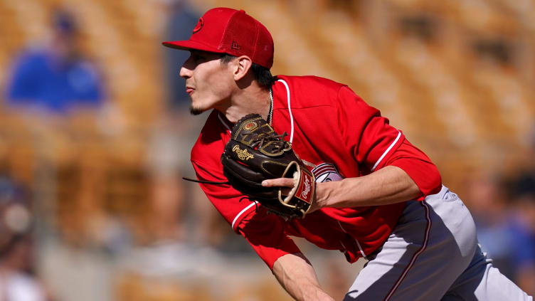 Cincinnati Reds pitcher Riley O'Brien (57) delivers during a spring training game.