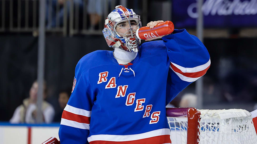 Sep 26, 2022; New York, New York, USA; New York Rangers goaltender Dylan Garand (98) drinks water during a game against the New York Islanders at Madison Square Garden. Mandatory Credit: Jessica Alcheh-Imagn Images