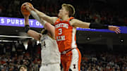 Dec 6, 2024; Evanston, Illinois, USA; Illinois Fighting Illini forward Ben Humrichous (3) defends Northwestern Wildcats center Matthew Nicholson (34) during the second half at Welsh-Ryan Arena. Mandatory Credit: David Banks-Imagn Images