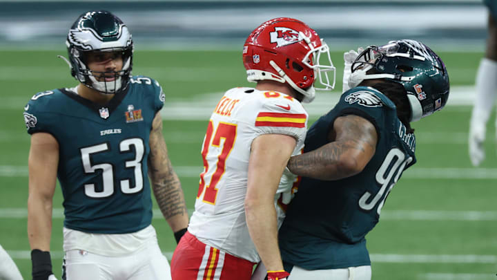 Feb 9, 2025; New Orleans, LA, USA; Kansas City Chiefs tight end Travis Kelce (87) bumps into Philadelphia Eagles defensive tackle Jalen Carter (98) in the fourth quarter in Super Bowl LIX at Ceasars Superdome. Mandatory Credit: Stephen Lew-Imagn Images