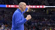 Mar 14, 2025; Nashville, TN, USA;  Kentucky Wildcats head coach Mark Pope screams to his team against the Alabama Crimson Tideduring the first half at Bridgestone Arena. Mandatory Credit: Steve Roberts-Imagn Images