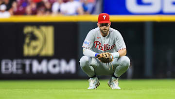 Aug 12, 2025; Cincinnati, Ohio; Philadelphia Phillies first baseman Bryce Harper (3) during a stop in play in the sixth inning against the Cincinnati Reds at Great American Ball Park. 