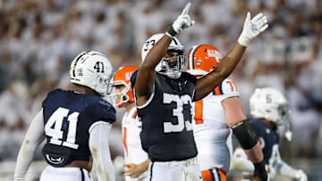 Penn State Nittany Lions defensive end Dani Dennis-Sutton (33)