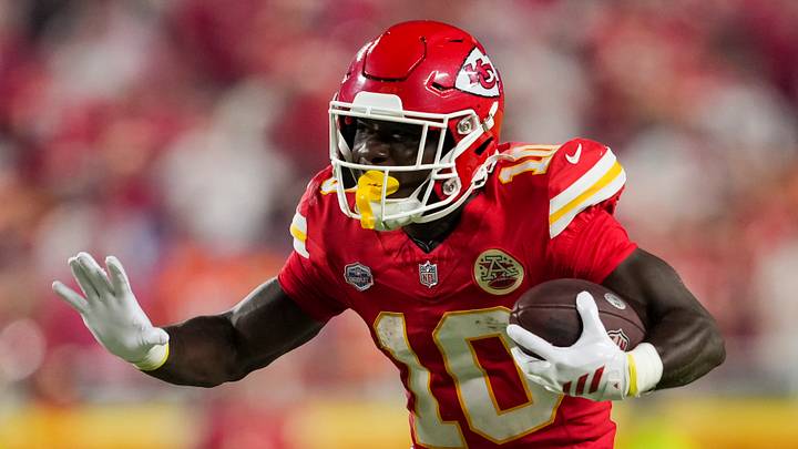 Kansas City Chiefs running back Emmett Johnson (10) runs with the ball