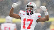 Ohio State Buckeyes wide receiver Carnell Tate (17) celebrates during the NCAA football game against the Michigan Wolverines at Michigan Stadium in Ann Arbor, Mich. on Nov. 29, 2025. Ohio State won 27-9.