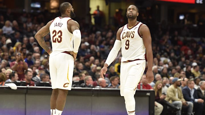 Nov 7, 2017; Cleveland, OH, USA; Cleveland Cavaliers forward LeBron James (23) and guard Dwyane Wade (9) stand on the court in the fourth quarter against the Milwaukee Bucks at Quicken Loans Arena. Mandatory Credit: David Richard-Imagn Images