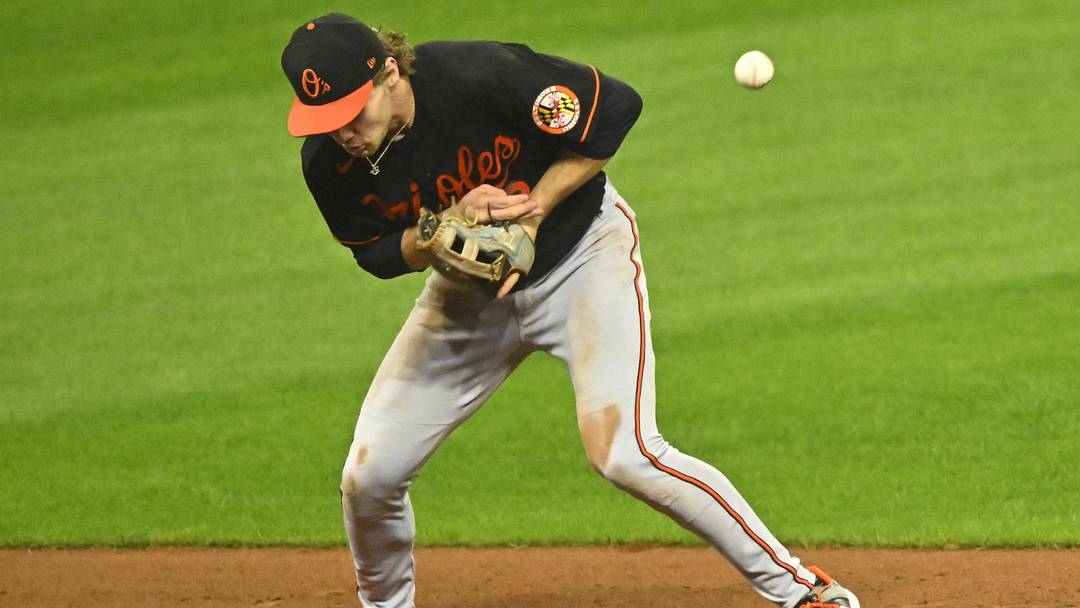 Sep 22, 2023; Cleveland, Ohio, USA; Baltimore Orioles shortstop Gunnar Henderson (2) commits a fielding error in the fourth inning against the Cleveland Guardians at Progressive Field. Mandatory Credit: David Richard-Imagn Images