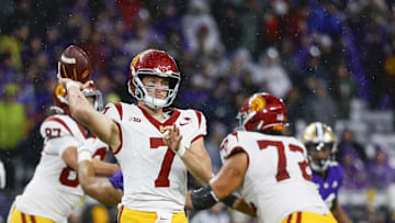 Nov 2, 2024; Seattle, Washington, USA; USC Trojans quarterback Miller Moss (7) passes against the Washington Huskies during the second quarter at Alaska Airlines Field at Husky Stadium. Mandatory Credit: Joe Nicholson-Imagn Images