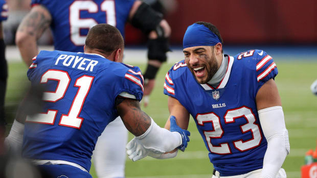 Bills safety Micah Hyde congratulates teammate Jordan Poyer after a defensive stand.Jg 010921 Bills 35