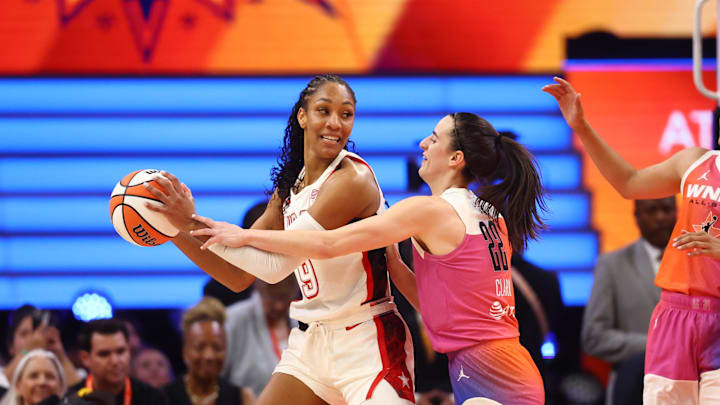 Jul 20, 2024; Phoenix, AZ, USA; USA Women's National Team forward A’ja Wilson (9) against Team WNBA guard Caitlin Clark (22) during the WNBA All Star game at Footprint Center. Mandatory Credit: Mark J. Rebilas-Imagn Images