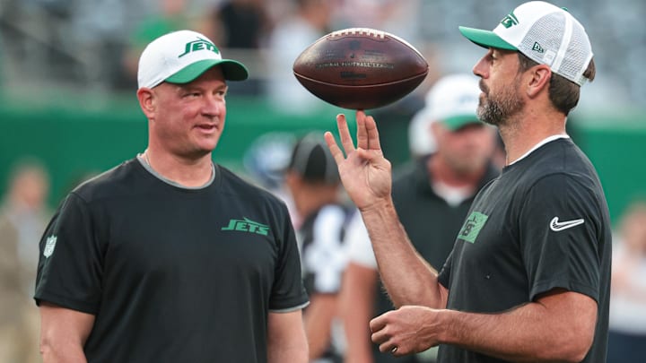 Aaron Rodgers (left) and Jets offensive coordinator Nathaniel Hackett.