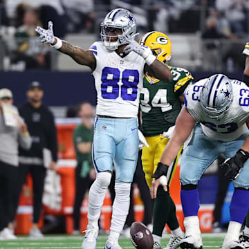 Dallas Cowboys wide receiver CeeDee Lamb (88) reacts after a play against the Green Bay Packers in the second half for the 2024 NFC wild card game at AT&T Stadium. 