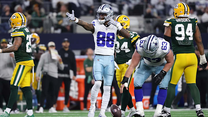 Dallas Cowboys wide receiver CeeDee Lamb (88) reacts after a play against the Green Bay Packers in the second half for the 2024 NFC wild card game at AT&T Stadium. 