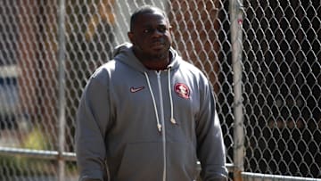 FSU football players walk into the first spring practice of the spring season on Wednesday, March 19, 2025