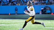 Dec 18, 2022; Charlotte, North Carolina, USA;  Pittsburgh Steelers wide receiver Diontae Johnson (18) with the ball in the third quarter at Bank of America Stadium. Mandatory Credit: Bob Donnan-USA TODAY Sports