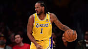 Jan 19, 2022; Los Angeles, California, USA; Los Angeles Lakers forward Trevor Ariza (1) controls the ball against /the Indiana Pacers during the first half at Crypto.com Arena. Mandatory Credit: Gary A. Vasquez-Imagn Images