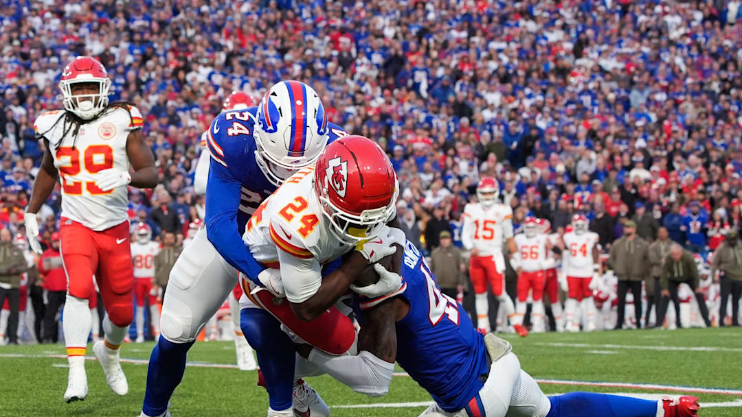 Nov 2, 2025; Orchard Park, New York, USA; Kansas City Chiefs running back Brashard Smith (24) is brought down by Buffalo Bills safety Cole Bishop (24) and cornerback Christian Benford (47) in the first quarter at Highmark Stadium. Mandatory Credit: Gregory Fisher-Imagn Images Nov 2, 2025; Orchard Park, New York, USA; Kansas City Chiefs running back Brashard Smith (24) is brought down by Buffalo Bills safety Cole Bishop (24) and cornerback Christian Benford (47) in the first quarter at Highmark Stadium. Mandatory Credit: Gregory Fisher-Imagn Images