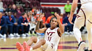 Mar 1, 2025; Blacksburg, Virginia, USA;  Virginia Tech Hokies guard Ben Hammond (11) celebrates making a shot and getting fouled during the second half at Cassell Coliseum. Mandatory Credit: Brian Bishop-Imagn Images