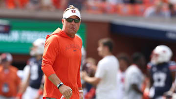 Sep 28, 2024; Auburn, Alabama, USA;  Auburn Tigers head coach Hugh Freeze watches his team warm up before the game against the Oklahoma Sooners at Jordan-Hare Stadium. Mandatory Credit: John Reed-Imagn Images