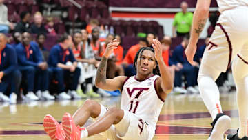 Mar 1, 2025; Blacksburg, Va.; Virginia Tech guard Ben Hammond (11) celebrates making a shot and getting fouled.