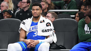 Feb 13, 2024; Milwaukee, Wisconsin, USA; Milwaukee Bucks forward Giannis Antetokounmpo (34) sits on the bench in the second half against the Miami Heat as he watches his team get beat 123-97 at Fiserv Forum. Mandatory Credit: Michael McLoone-USA TODAY Sports