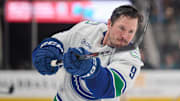 Nov 2, 2024; San Jose, California, USA; Vancouver Canucks center J.T. Miller (9) warms up on the ice before the game between the Vancouver Canucks and the San Jose Sharks at SAP Center at San Jose. Mandatory Credit: Robert Edwards-Imagn Images
