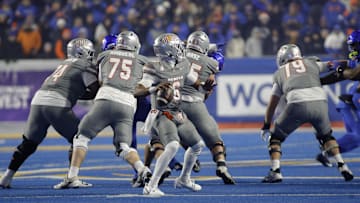 UNLV Rebels quarterback Hajj-Malik Williams (6) throws down field during the second half against the Boise State Broncos at Albertsons Stadium. Boise State beats  UNLV 21-7. 