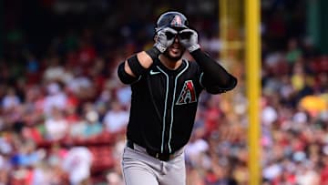 Aug 25, 2024; Boston, Massachusetts, USA; Arizona Diamondbacks third baseman Eugenio Suarez (28) reacts to his three run home run against the Boston Red Sox during the sixth inning at Fenway Park.