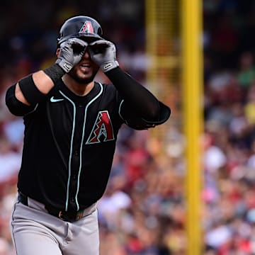 Aug 25, 2024; Boston, Massachusetts, USA; Arizona Diamondbacks third baseman Eugenio Suarez (28) reacts to his three run home run against the Boston Red Sox during the sixth inning at Fenway Park. Mandatory Credit: Eric Canha-Imagn Images