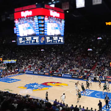 Nov 3, 2025; Lawrence, Kansas, USA; A general view of the court as Kansas Jayhawks guard Elmarko Jackson (13) shoots against during the first half against the Green Bay Phoenix at Allen Fieldhouse. Mandatory Credit: Jay Biggerstaff-Imagn Images