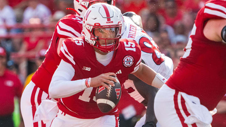 Oct 5, 2024; Lincoln, Nebraska, USA; Nebraska Cornhuskers quarterback Dylan Raiola (15) runs against the Rutgers Scarlet Knights during the second quarter at Memorial Stadium. Oct 5, 2024; Lincoln, Nebraska, USA; Nebraska Cornhuskers quarterback Dylan Raiola (15) runs against the Rutgers Scarlet Knights during the second quarter at Memorial Stadium.