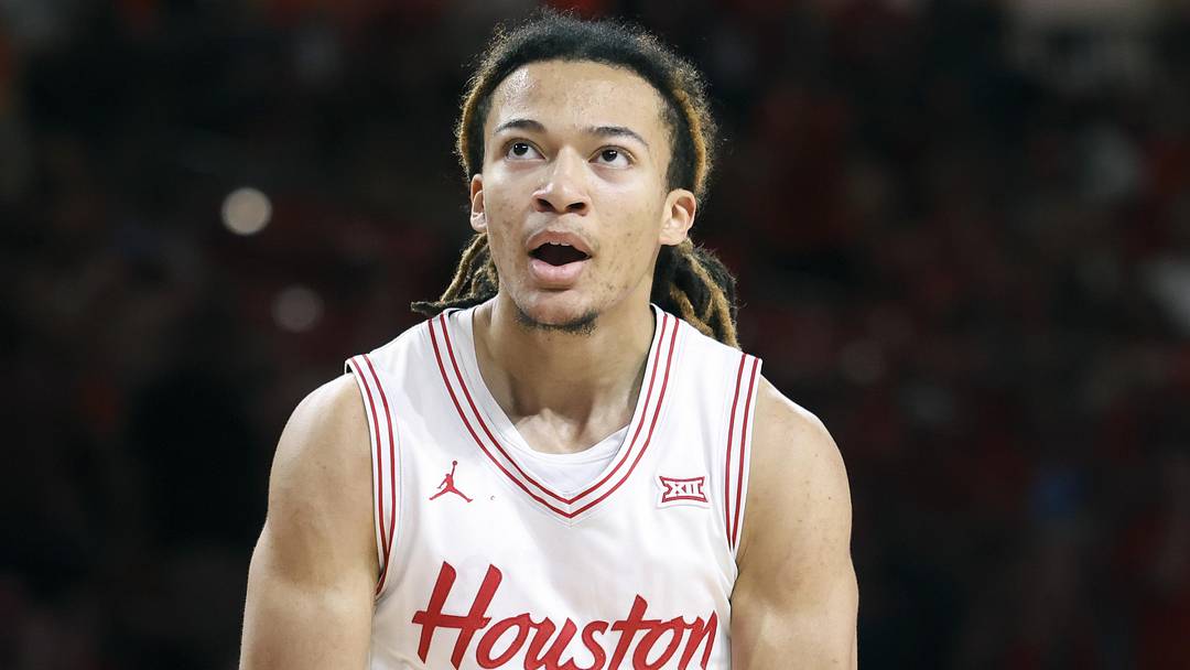 Houston Cougars guard Kingston Flemings (4) reacts after scoring a basket during the first half against the Towson Tigers at Fertitta Center on November 8, 2025.