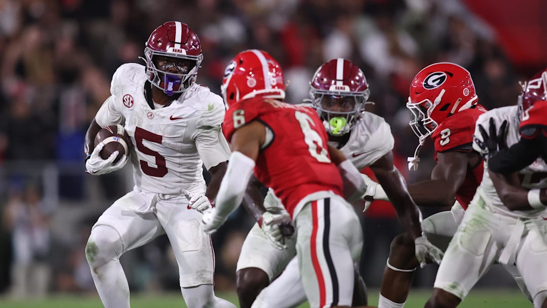 Sep 27, 2025; Athens, Georgia, USA; Alabama Crimson Tide wide receiver Germie Bernard (5) runs against Georgia Bulldogs defensive back Daylen Everette (6) in the second half at Sanford Stadium. Mandatory Credit: Brett Davis-Imagn Images